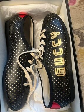 Gucci Black Leather Star-Print Lace-Up Sneakers with Gold Logo and Red Heel Tab